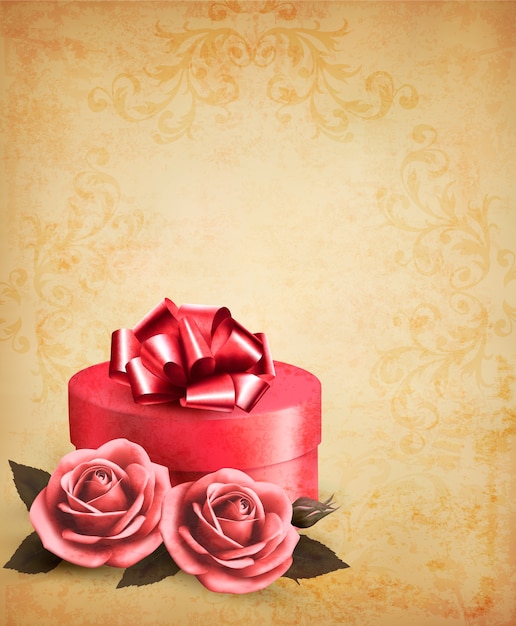 Retro background with beautiful red roses and gift box