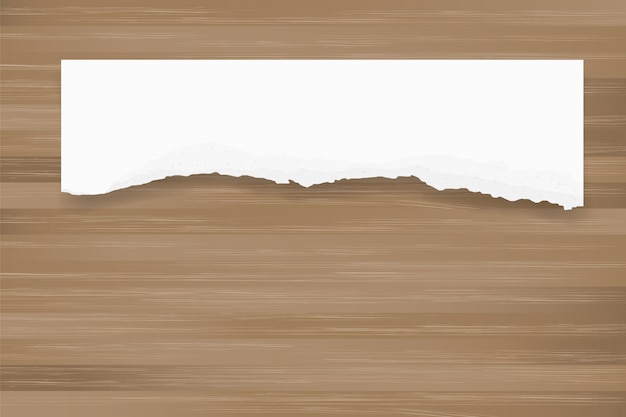 Vector ripped paper background on brown wood texture.