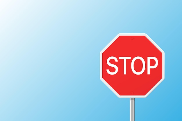 Дорожный знак STOP на синем небесном фоне