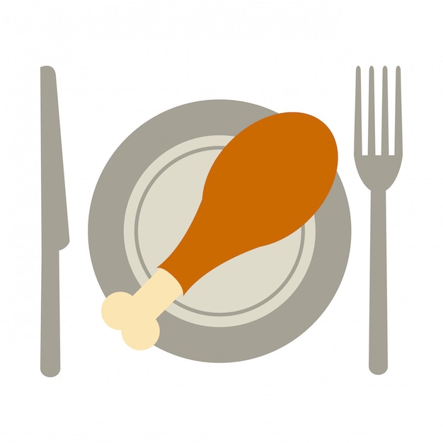 Roasted chicken on dish with cutlery