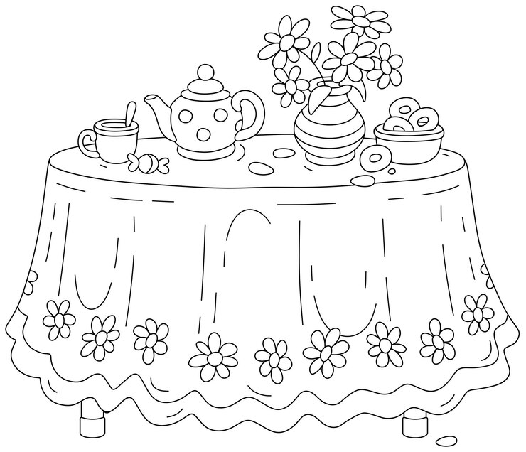Round kitchen table with a beautiful tablecloth a vase with summer flowers and a tea set