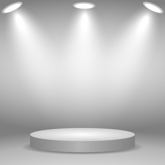 Round podium, pedestal or platform illuminated by spotlights on white