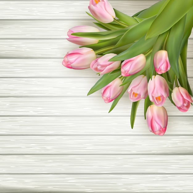 Roze tulpen over witte houten tafel, achtergrond