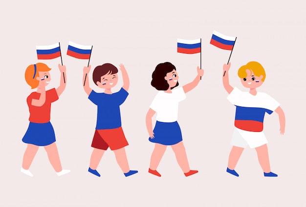 ロシア独立記念日のコンセプト。ロシアの子供たちは国旗を振っています