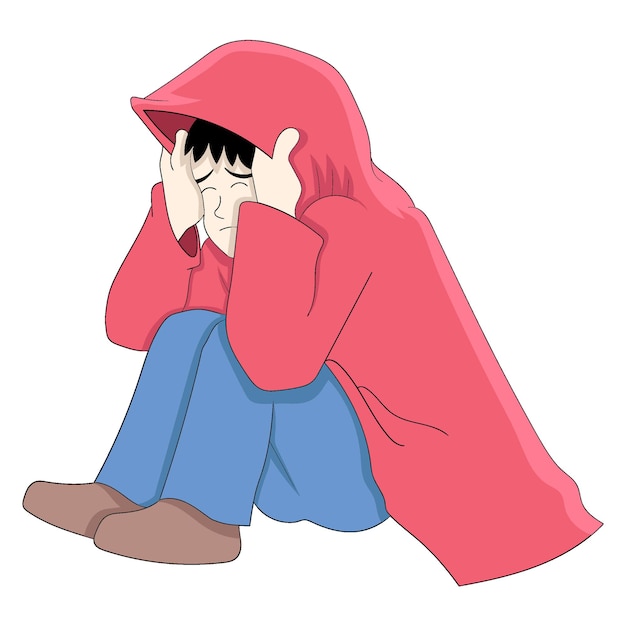 Sad boy is sitting wearing a hoodie jacket