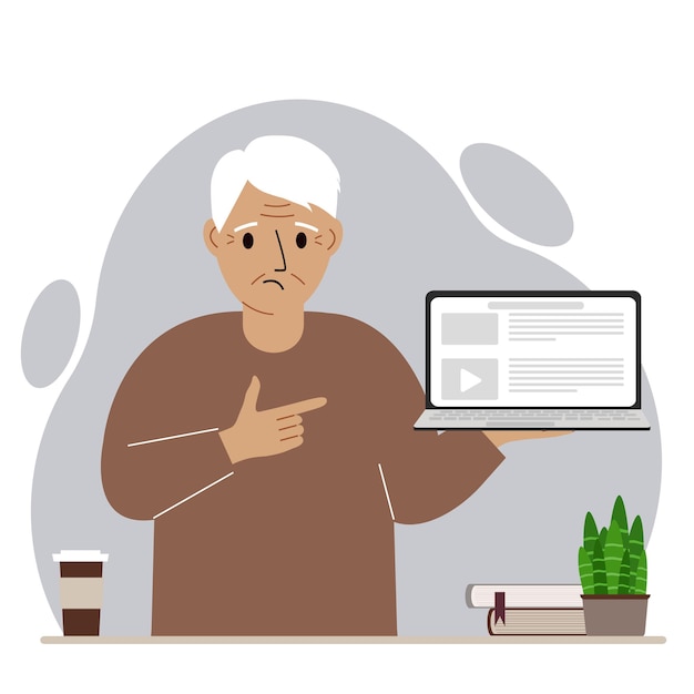 Sad grandfather holding a laptop computer with one hand and pointing at it with the other. Laptop computer technology concept.