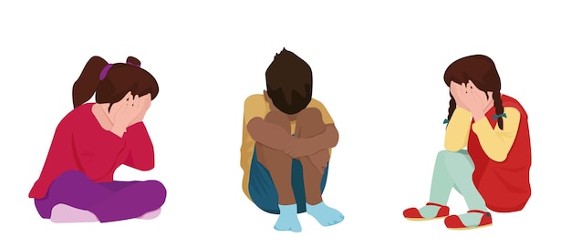 a sad offended child is sitting with his hands clasped around his knees and his face covered