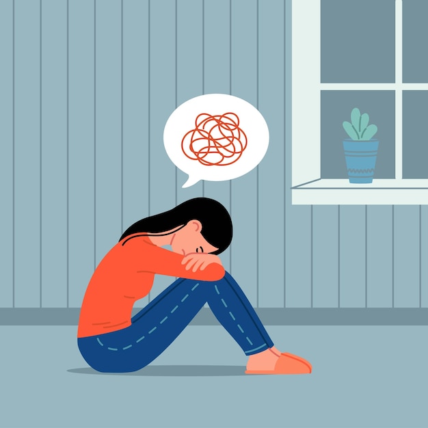 sadness mental depression unhappy woman sitting on the floor at home hugging knees hands