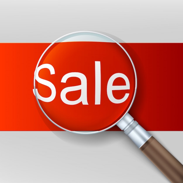 Sale. Magnifying glass over red background.