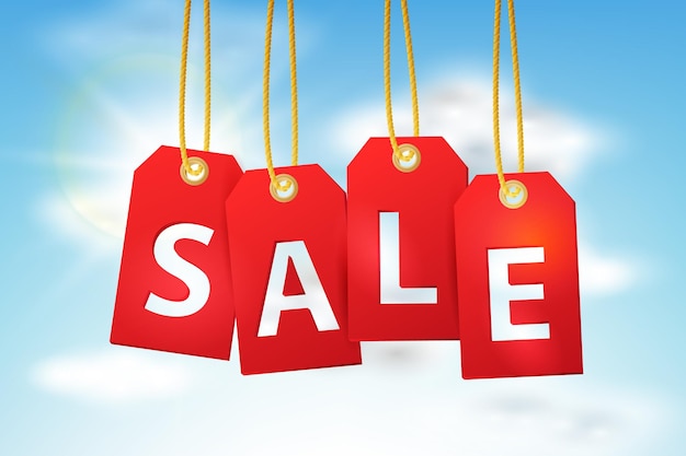 Sale tags on the blue sky background