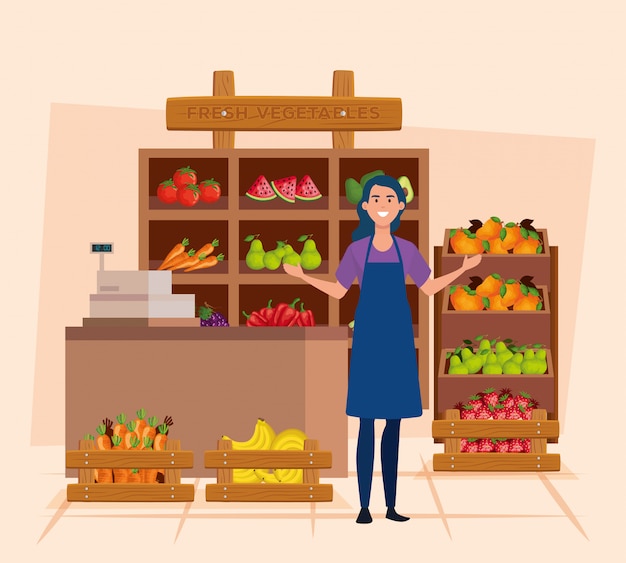 Saleswoman with apron and fresh vegetables and fruits