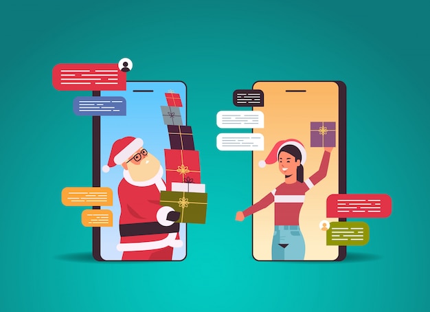 Il babbo natale che dà i contenitori di regalo alla donna che usando concetto di celebrazione di celebrazione di feste di natale di comunicazione della rete sociale di app