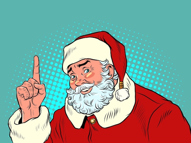 Santa claus points his index finger up christmas and new year winter seasonal holiday in december