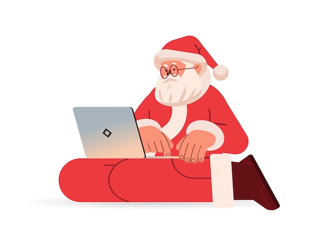 Vector santa claus in red costume typing on laptop happy new year merry christmas holidays celebration concept isolated