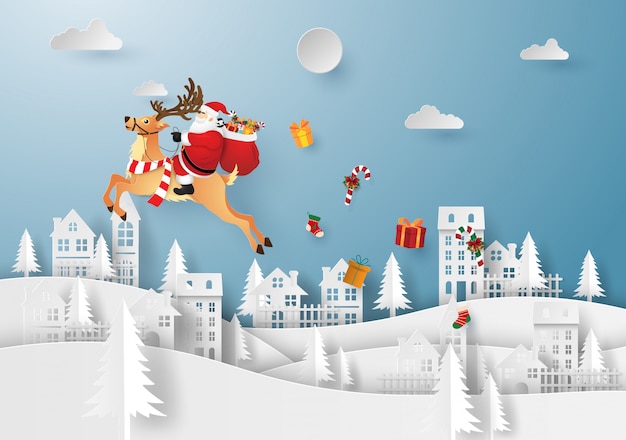 Santa claus and reindeer in the village