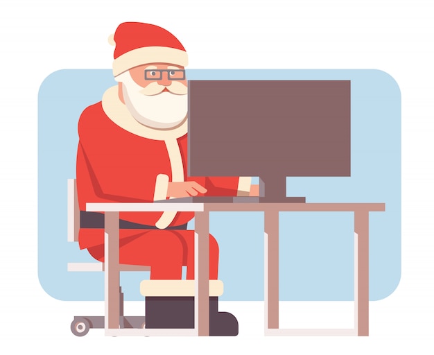 サンタクロースはコンピューターに座っています。
