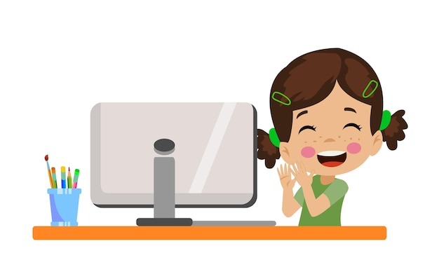 Schattige kleine jongen achter de computer