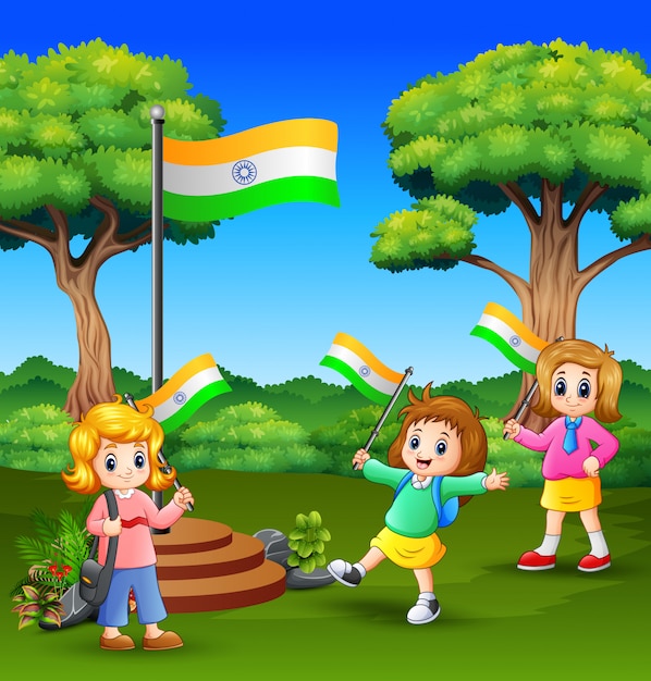Schattige kleine kinderen houden van nationale vlag en genieten van de natuur