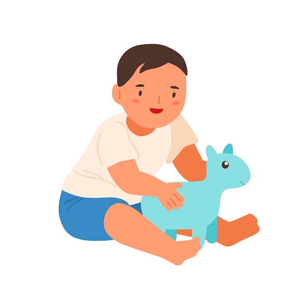 Schattige lachende kind spelen met zacht stuk speelgoed platte vectorillustratie. gelukkig jongetje zitten knuffelen speelgoed geïsoleerd op een witte achtergrond. schattige baby genieten van jeugd met positieve emotie.