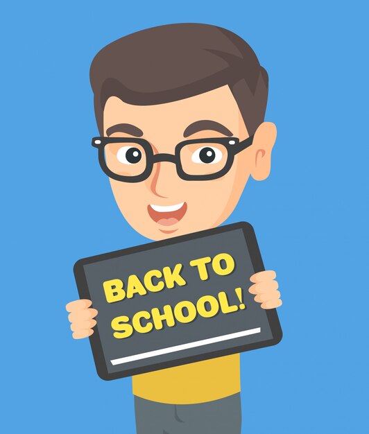 Vector schoolboy holding tablet with text back to school.