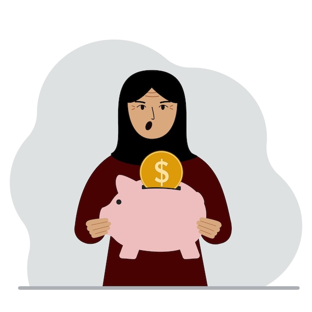 La donna musulmana urlante tiene un salvadanaio una moneta cade nel salvadanaio il concetto di risparmio finanziario risparmio di investimento finanziario