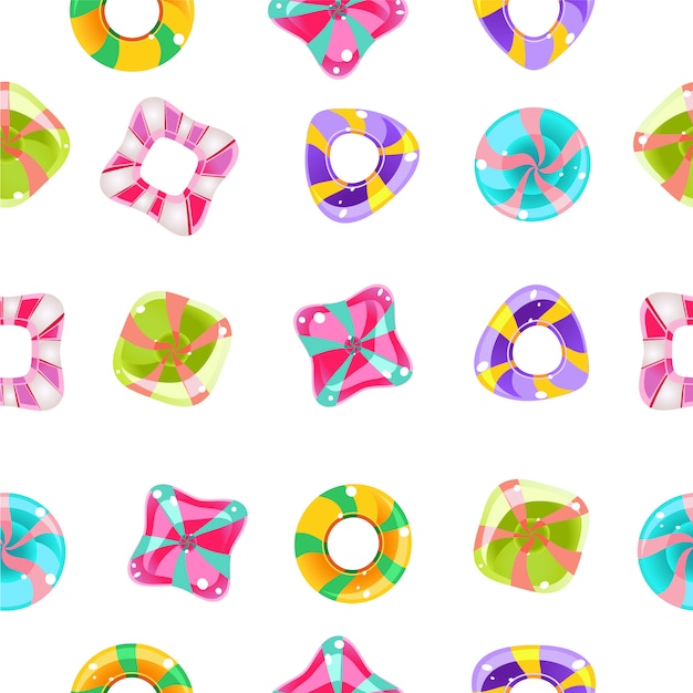 Seamless background with colorful candies on a white background.