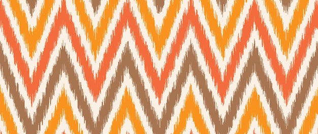 Modello ikat senza soluzione di continuità chevron etnico a zigzag ripetendo lo sfondo tessuto tribale ornamentale