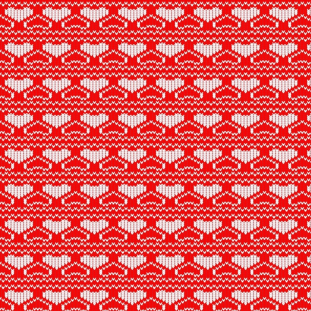 Seamless knitted white and red hearts pattern