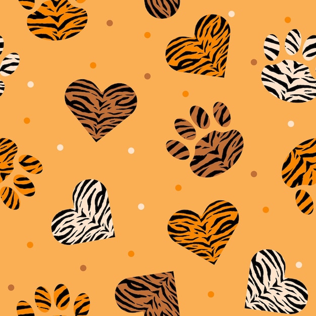 Seamless pattern of animal skin in shape of heart and paw leopard tiger and zebra