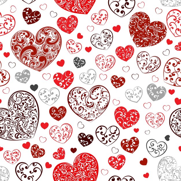 Seamless pattern of big and small hearts with curls red and brown on white