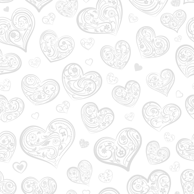Seamless pattern of big and small hearts with ornament of curls flowers and leaves gray on white