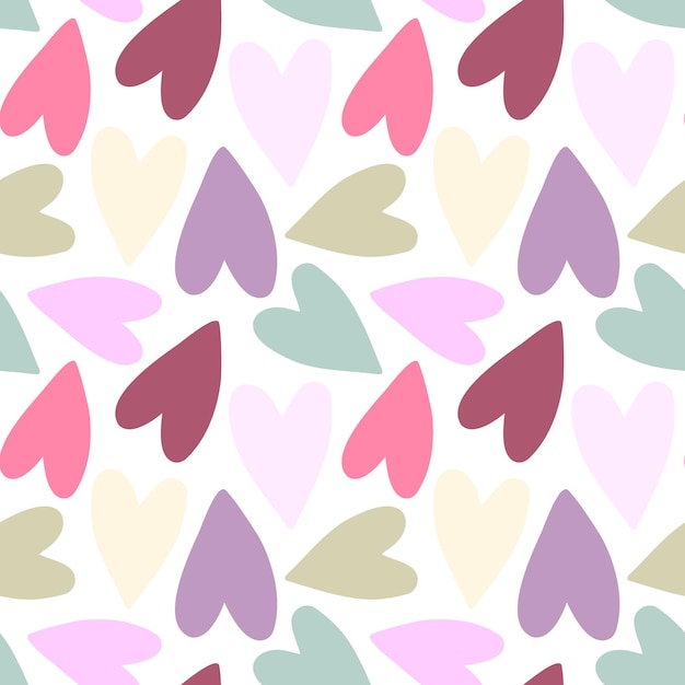 Seamless pattern of colourful hand drawn heart in pink shades and isolated background.