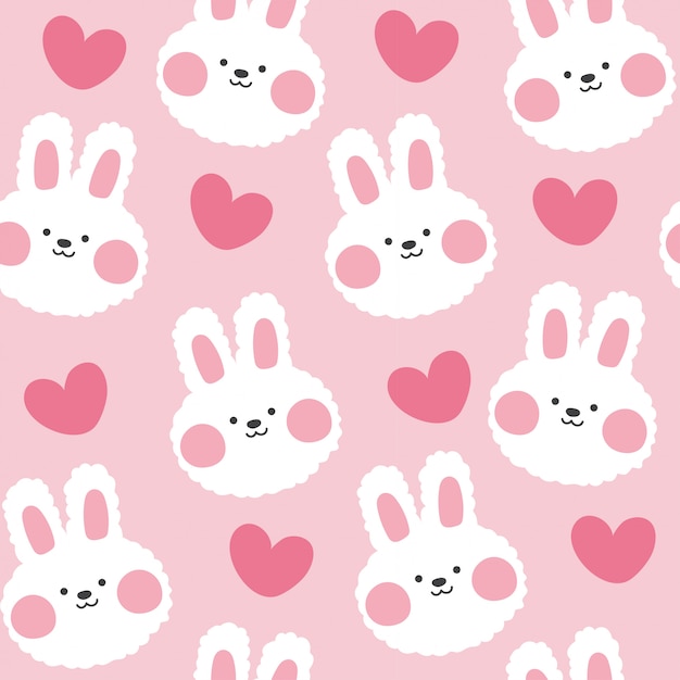 Vector seamless pattern of cute rabbit with heart