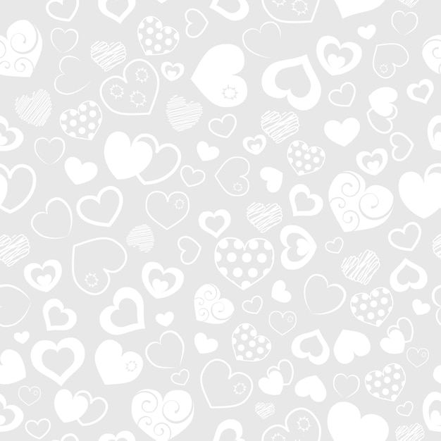 Seamless pattern of various hearts white on gray