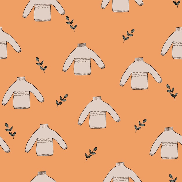 Vector a seamless pattern warm sweaters and leaves