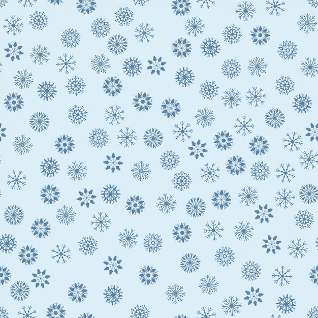 Seamless pattern which blue snowflakes in hand drawn style