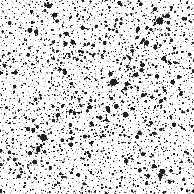 Vector seamless pattern of a wide variety of black ink splashes and blots on a white background