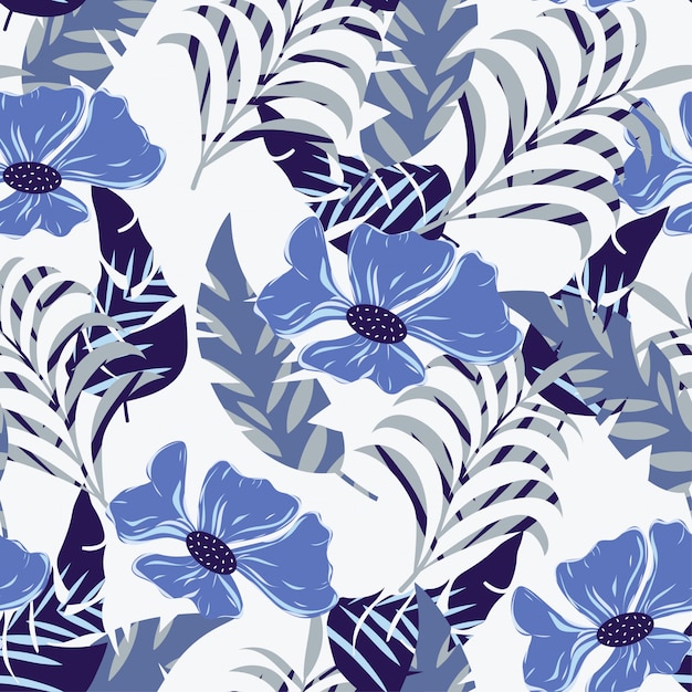 Seamless pattern with blue tropical leaves and flowers