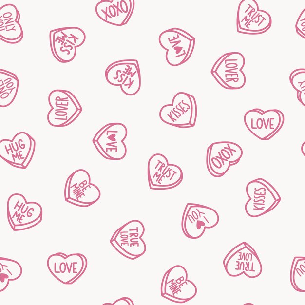 Seamless pattern con candy hearts su sfondo rosa caramelle a forma di cuori con messaggi