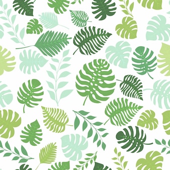 Modello senza cuciture con piante esotiche della giungla. foglie di palma tropicali. illustrazione della foresta pluviale, nei colori verdi.