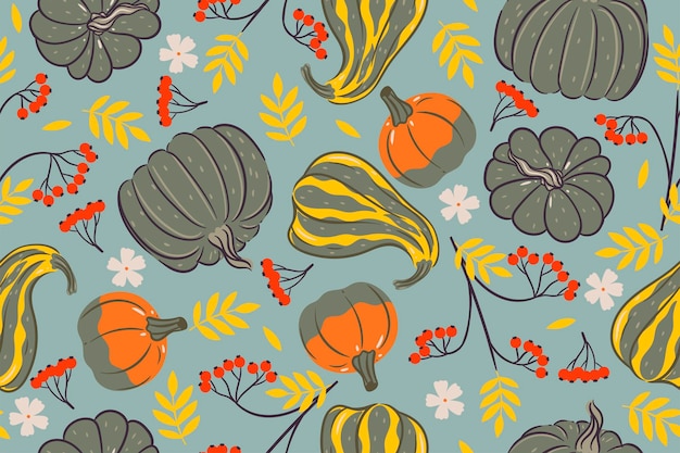 Seamless pattern with pumpkins and rowan branches vector graphics