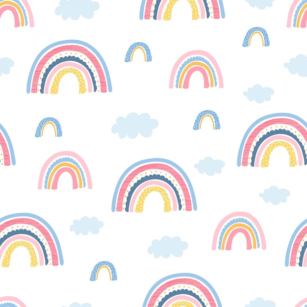 Vector seamless pattern with rainbow, clouds and hand letters focus on the good for kids