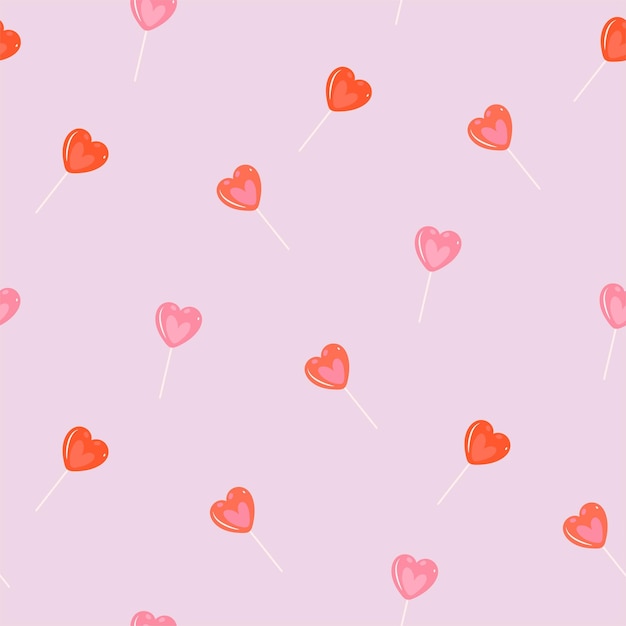 Seamless pattern with red and pink lollipop hearts Vector graphics