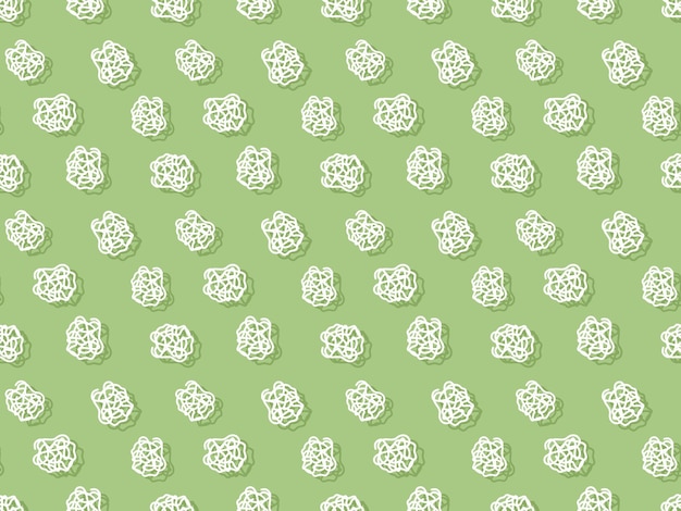 Бесшовный узор с белыми цветами на зеленом фоне.