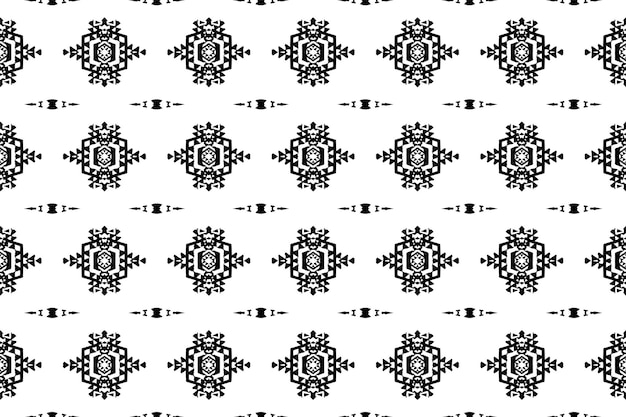 A seamless patterngeometric tribalgeometric batik ikataztecblack and white seamless pattern