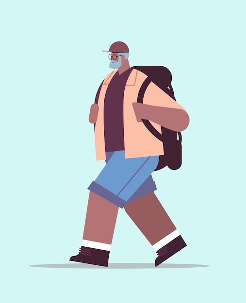 Senior african american man hiker traveling with backpack active old age physical activities concept