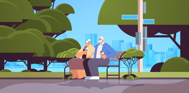 Senior couple sitting on bench and eating ice cream happy grandparents spending time together in park