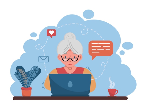 a senior lady works at the computer the concept of inclusion and tolerance at workgranny with the computer