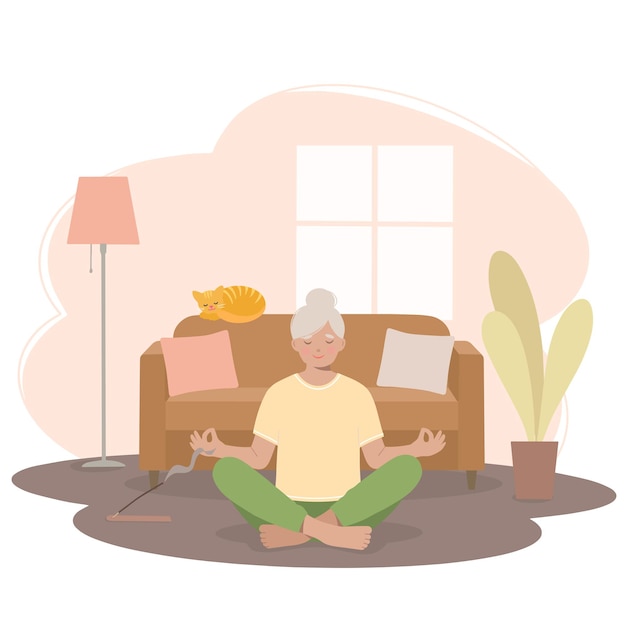 Senior woman meditating Woman in a yoga pose in a lotus position in the living room