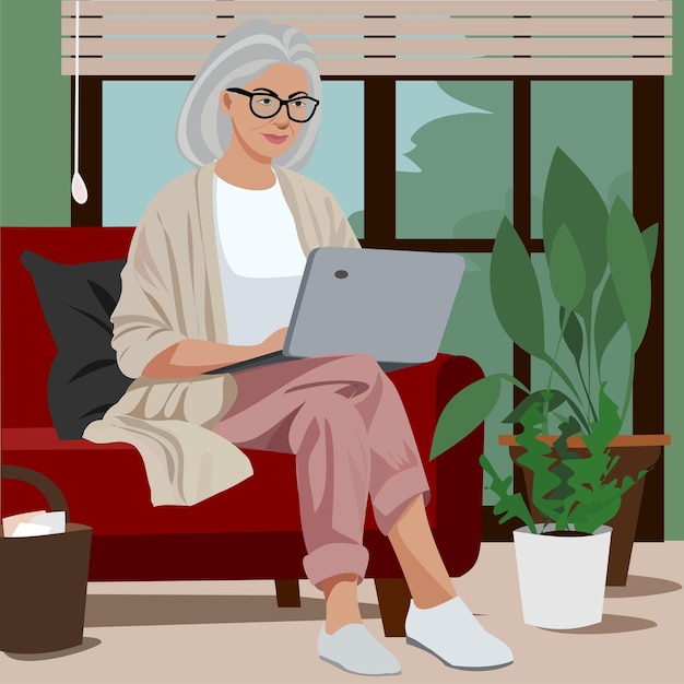 Senior woman working on a laptop at home